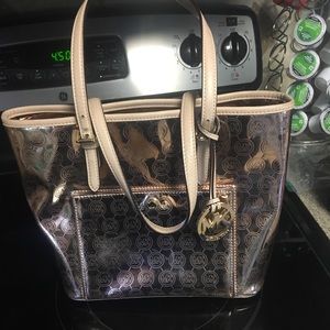 Rare Rose Gold Michael Kors purse and wallet
